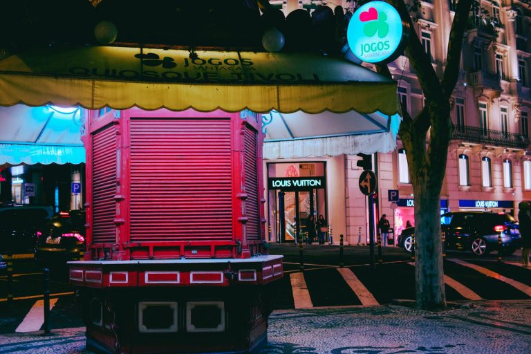 a red and yellow building on a city street